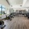 large windows brighten spacious fitness center