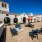 firepit surrounded by chairs in courtyard