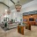 open leasing lounge with vaulted ceilings and chandeliers