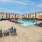 lounge chairs surround outdoor pool