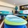 room with many surfboards